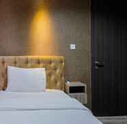 Bedroom 4 Luxury 2BR Apartment at Bintaro Icon By Travelio