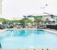 Swimming Pool 5 2BR Comfy and Spacious Callia Apartment By Travelio