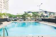 Swimming Pool 2BR Comfy and Spacious Callia Apartment By Travelio