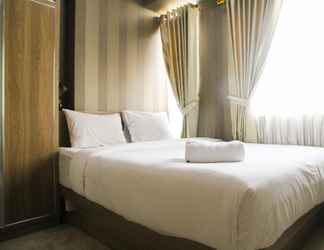 Phòng ngủ 2 1BR with Extra Balcony The Oasis Apartment Cikarang By Travelio