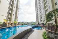 Swimming Pool 2BR Clean and Cozy Apartment @ Parahyangan Residence By Travelio