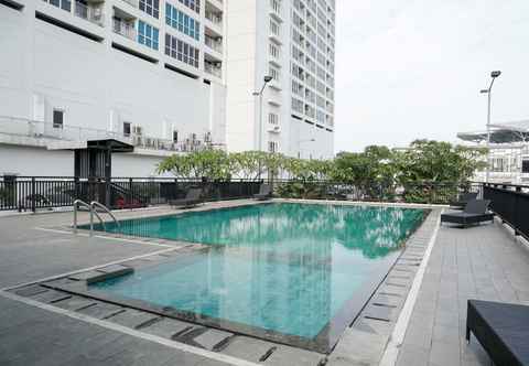 Lobby 1BR Spacious with City View at Callia Apartment By Travelio