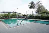 Swimming Pool 1BR Spacious with City View at Callia Apartment By Travelio