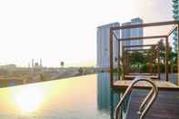 Swimming Pool Studio Cozy Apartment @ Grand Kamala Lagoon By Travelio