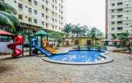 Swimming Pool 4  Studio Pool View at Kebagusan City Apartment By Travelio