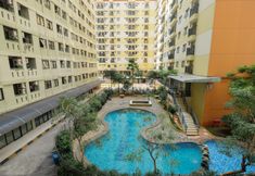 Swimming Pool 3  Studio Pool View at Kebagusan City Apartment By Travelio