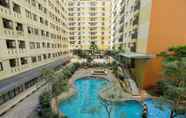 Swimming Pool 3  Studio Pool View at Kebagusan City Apartment By Travelio