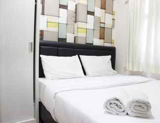 Bedroom 2 Classic 2BR The Suites Metro Apartment By Travelio