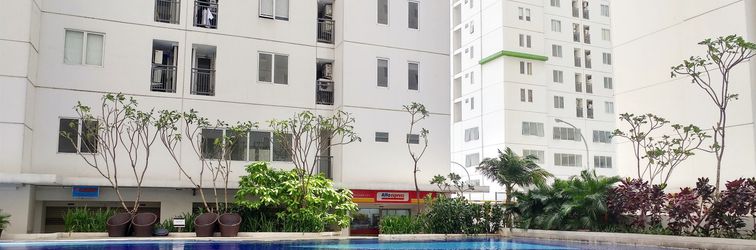 Lobi Minimalist 2BR Bassura City Apartment By Travelio