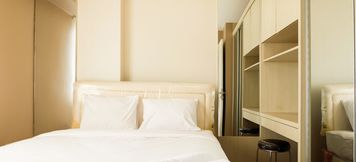 Bilik Tidur 6 Minimalist 2BR Bassura City Apartment By Travelio