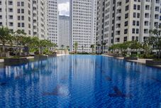 Swimming Pool Comfortable 2BR M-Town Residence Apartment By Travelio