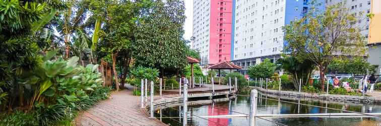 Lobby Relaxing 2BR Green Pramuka Apartment By Travelio