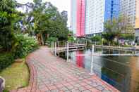 Lobby Relaxing 2BR Green Pramuka Apartment By Travelio