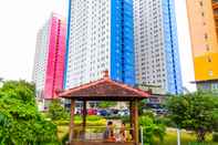 Bangunan Relaxing 2BR Green Pramuka Apartment By Travelio