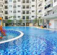 Swimming Pool 3 Affordable 1BR Signature Park Grande Apartment By Travelio