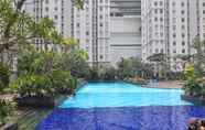 Swimming Pool 2 Best 2BR Green Bay Pluit Apartment By Travelio