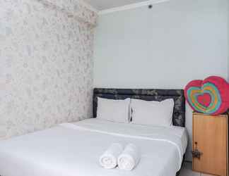 Bedroom 2 Homey Emerald 2BR Gading Nias Residences Apartment By Travelio