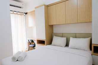Phòng ngủ 4 Homey 2BR M-Town Residence Apartment By Travelio