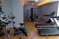 Fitness Center 2BR Simply Living at Bassura City Apartment By Travelio