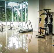 Fitness Center 4 2BR with Sofa Bed at Apartment Woodland Park Residence By Travelio