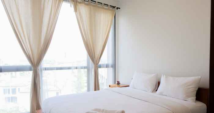 Bedroom 1BR Luxurious at Marigold Nava Park Apartment By Travelio