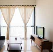 Common Space 2 1BR Luxurious at Marigold Nava Park Apartment By Travelio