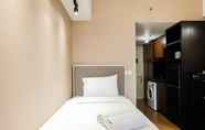 Bedroom 7 Apartment Studio at M-Town Residence near Summarecon Mall Serpong By Travelio