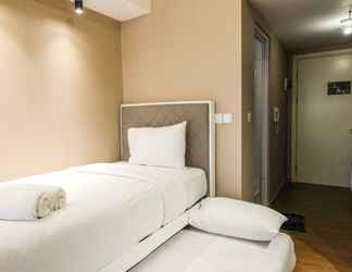 Bedroom 2 Apartment Studio at M-Town Residence near Summarecon Mall Serpong By Travelio