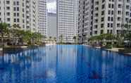 Swimming Pool 4 1BR Nice Apartment at M-Town Signature By Travelio