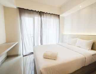 Bedroom 2 Cozy 1BR Apartment at Oasis Cikarang By Travelio