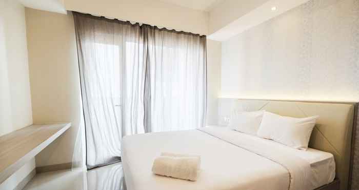Bedroom Cozy 1BR Apartment at Oasis Cikarang By Travelio