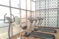 Fitness Center Cozy 1BR Apartment at Oasis Cikarang By Travelio