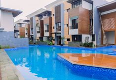 Lobby 2 1BR Comfy Asatti Apartment at Vanya Park BSD By Travelio