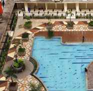 Swimming Pool 3 1BR + 1 Cozy at Kemang View Apartment Bekasi By Travelio