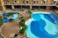 Swimming Pool Studio Minimalist and Comfy Pluit Sea View Apartment By Travelio