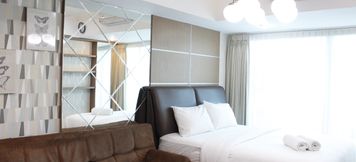 Bilik Tidur 5 Studio Premium Room @ Tamansari La Grande Apartment By Travelio