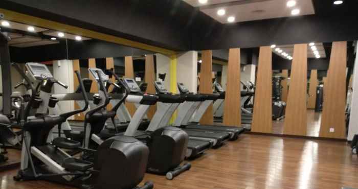 Fitness Center Studio Modern at Signature Park Grande Apartment By Travelio