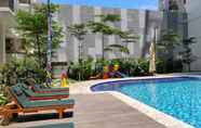 Swimming Pool 3 Studio Modern at Signature Park Grande Apartment By Travelio