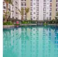 Swimming Pool 2 Best 2BR Apartment at Cinere Resort By Travelio