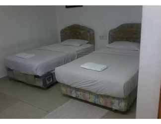Phòng ngủ 2 SUPER OYO 90494 Sam Huat Hotel
