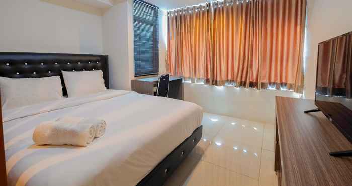 Bedroom 1BR Elegant at Grand Kamala Lagoon Apartment By Travelio