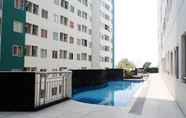 Swimming Pool 3 2BR Comfortable Apartment at Pavilion Permata By Travelio