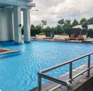 Swimming Pool 2 Vibrant Soho Studio Room Apartment at Pakubuwono Terrace By Travelio