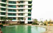 Kolam Renang 5 Comfy and Modern 2BR Grand Kamala Lagoon By Travelio