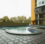 Swimming Pool 4 2BR Modern With City View @ Pancoran Riverside Apartment By Travelio