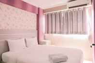 Bedroom 2BR Comfortable Apartment at Sentra Timur Residence By Travelio