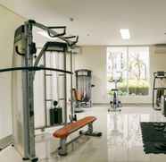 Fitness Center 3 2BR Comfortable Puri Orchard Apartment By Travelio