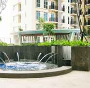 Swimming Pool 4 2BR Comfortable Puri Orchard Apartment By Travelio