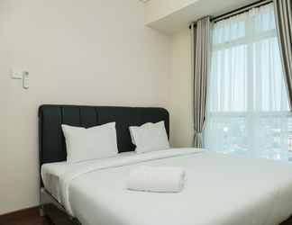 Bedroom 2 2BR Simply Furnished at Puri Orchard Apartment By Travelio