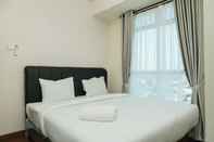 Kamar Tidur 2BR Simply Furnished at Puri Orchard Apartment By Travelio